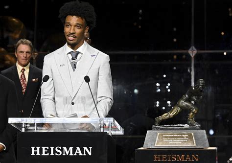 Washington Quarterback Former Lsu Heisman Winner Jayden Daniels Throws